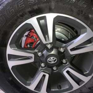 Power Stop brakes in the rear. Slotted and drilled rotors, coated calipers, composite and carbon fiber pads.