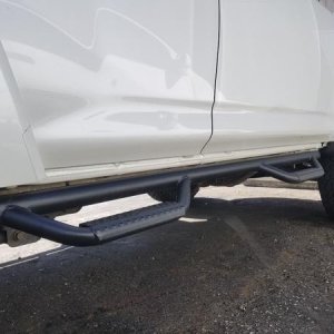 Removed side skirt and modified nfab steps to fit closer.
