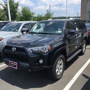 at the dealership signing papers