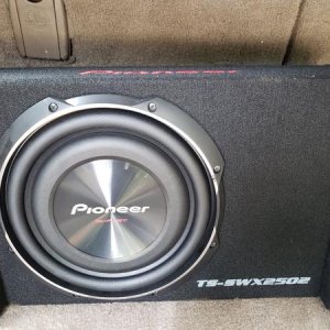 Subwoofer - Pioneer 10 inch. Sealed box. Running 500 watts from Alpine 500 watt amp.