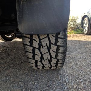 Toyo AT 2 (E rated) 275/65/18 @35psi(cold)

After roughly 1/2 mile on dirt/gravel road and parking lot.