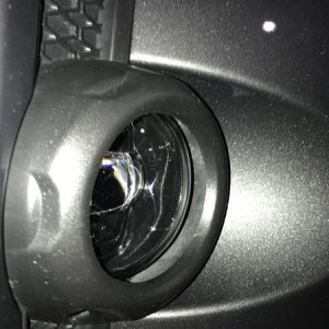 Morimoto installed into position. Notice the large gap between the lens and the housing on the bumper.