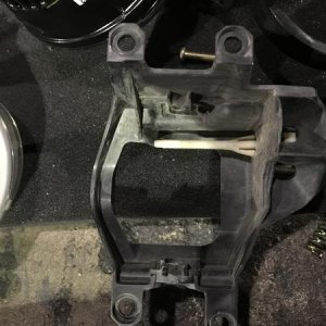OEM fog light mount removed/separated from light fixture.