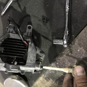 After placing the OEM mounting bracket, place back the plastic screw that used for the alignment of the fog lights.