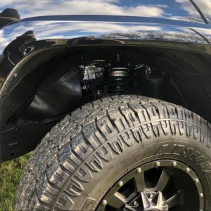 Passenger front suspension peek