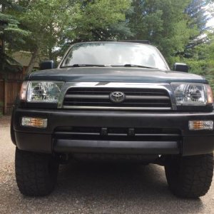 New headlights, turn signals, painted bumper and valence