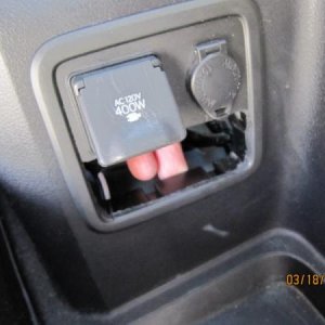 IMG 6240
To remove this panel prior to cutting it you need to reach inside the wheel well and lift up on the center tab. I tried to 
illustrate this i
