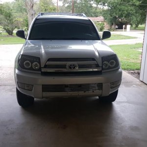Before I plasti dipped the front end.  I had just added three piece billet grille with projector style headlights.