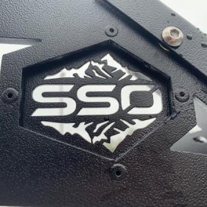 SSO changed from the stainless steel looking logo to powder coated black on their roof racks