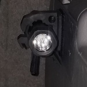 Maglite mount trunk panel.