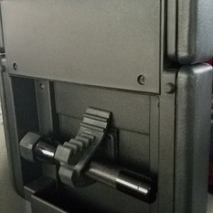 Heavy duty velcro mounted small Maglite in center console.