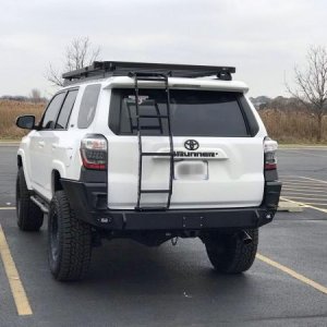 C4 rear bumper (single swing-out, currently in stealthy mall-crawler mode) and ladder