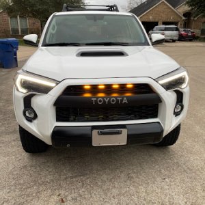 Morimoto XB LED with Overland Depot Raptor lights in grille.