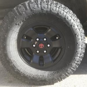 Matte black wheels with red Toyota and masked off bolts - 11/2/20
