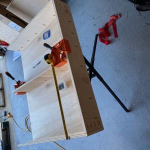 measuring and bracing the divider.  If I did this again, I would cut pieces of wood to use to brace where drawers go and ensure even fit.