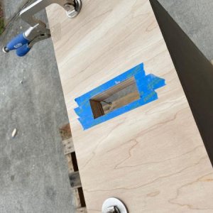 Taped off the drawer front to prevent splintering when cutting. 3/4 blatic on front of 1/2 drawers for strength and depth.
