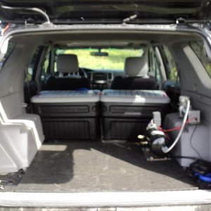 removed seats, rhino lined interior, train horn and air tool set. made a mat for the deck also