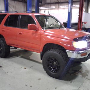 lifted with wheels/tires, hids, and bug deflector