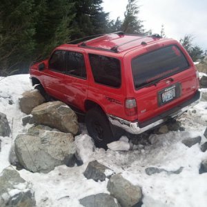 got high centered on transfer-case cross member,  over  huge rock.
lucky for my doors i had rock sliders!!
