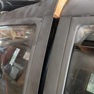 Driver's side door was bent and wouldn't open without some serious upward force.