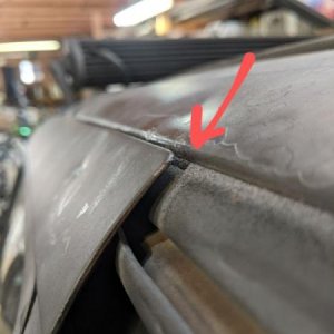 After bending the driver's side door back into place.