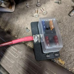 Wired the light bar on top into a cheapo aux box I picked up from Walmart day-of.