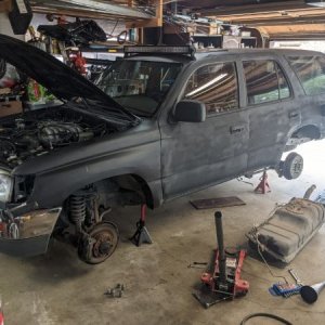 Got the tank dropped. It was a balancing act as I don't have a transmission hoist, just a floor jack, and the tank was over halfway full. Also also, I