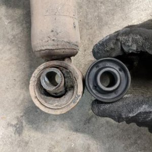 The old bushing versus the new bushing. I feel the need to specify that the old one is on the left and the new one is on the right, since the differen