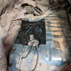I didn't think about this part until the tank was back in. Much of the dust that was in the cabin was coming in through this not-at-all sealed hole. I