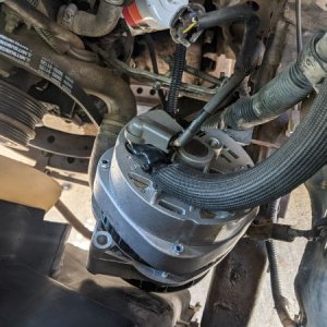 Sweet shot of the back of the alternator. I was able to use the "bend and drill" technique in Doc's CS144 thread to reuse the stock connector and plas