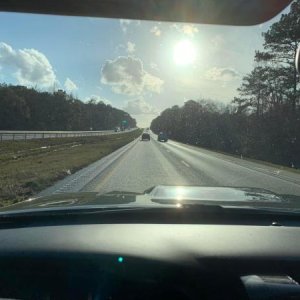 At some forward sun angles, the glare off the back of the scoop is excruciating (worse than the phone pic makes it look), and my daily commute has me 