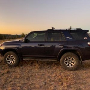 Side view with 2" lift and 255/80 Coopers