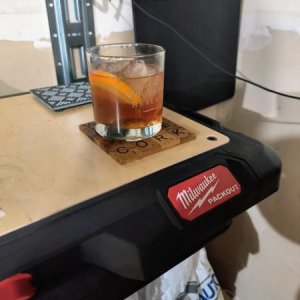 Runner Garage overpriced  Milwaukee shelf table. And Canadian Whiskey