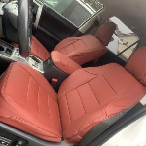 Upgraded all seven cloth seats to Lexus (look-a-like) red leather.