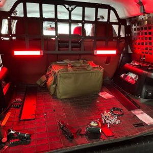 Victory 4X4 Molle panel/pet divider. 

*LED lights are rechargeable under cabinet motion lights from Amazon.