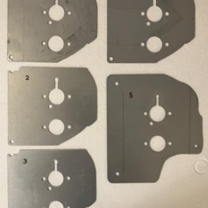 Mounting plate and four spacers. Install #5 first on the 4Runner sheet metal floor, then #4, #3, #2, and finally #1 on top, with some heat- and oil-re