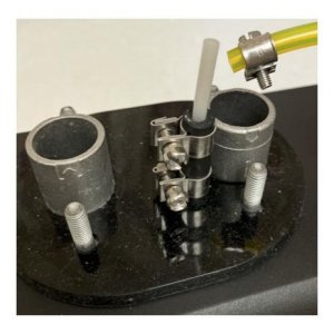 Fuel line connection at heater. The heater kit comes with white hard nylon(?) fuel line (2mm I.D., 4mm O.D.). It also comes with short rubber connecto