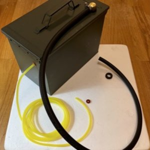 Ammo can fuel tank. 1/2" NPT Brass Rollover Safety Valve from www.boydwelding.com with 5/16" I.D., 5/8" O.D. fuel hose vents the ammo can to the outsi