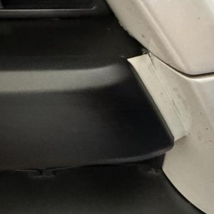Close up of Plasti Dip on top piece behind cap overlay on front grill