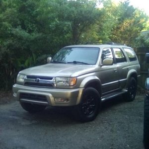Day I bought it. Totally stock except previous owner painted the rims black. Had 116000 miles on it.