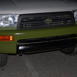 Closer to the paint. I separated the valance from the metal bumper and I masked off the portions that were black and green.