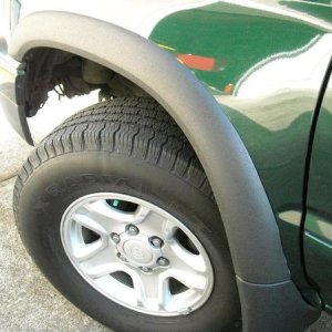 My fender flares painted with bedliner.