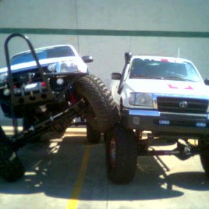 My buddy and I at our old work I am the truck with the Rocktek Bumper