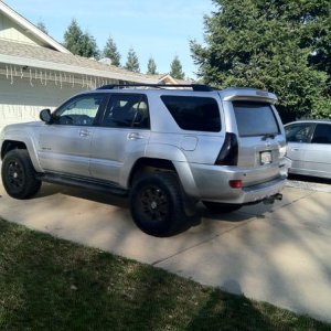 Another picture of her lifted with the blacked out taillights and emblems.  Really enjoying the new toy.