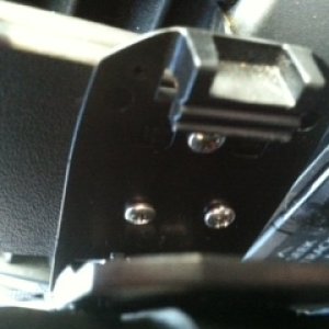 Took apart the otterbox holster (as seen on "how its made"), made a simple hole pattern, drilled holes, screwed together, and reassembled... that simp