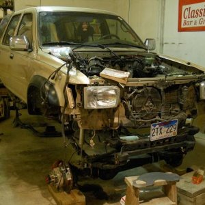 My poor naked truck!  Even with the wheels off and sitting on blocks, the darn thing is still tall.