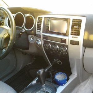 inside pioneer double din and custom Toyota logo on lower compartment