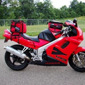 '97 Honda VFR750--great all-around bike, with racer looks but a reasonable seating position (hence the bags, for longer rides).  V4 engine had power e