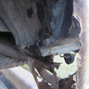 Rear driver side wheel well