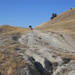 The route down the backside of the large wall of hills.  The trail is simple, but bumpy, with some jagged rocks poking up here and there.